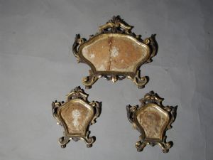 Trittico di carta glorie in legno intagliato dorato e laccato marrone XVIII° sec. cm.35x 25